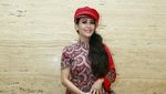 Meriam Bellina Cantik Bertopi Merah