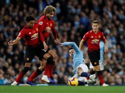 Paul Pogba tak ada dalam daftar pemain MU. Dia mengalami cedera. Tanpa Pogba, MU menelan kekalahan dengan skor akhir 1-3. (Foto: Darren Staples/Reuters)