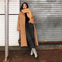 Aimee Song atau juga dikenal sebagai Song of Style menginspirasi dunia dengan gayanya yang stylish dan kekinian. Kini ia memiliki 4,9 juta followers dan bisa mendapat US$ 7 ribu atau Rp 103 juta sekali posting. Foto: Dok. Instagram/@songofstyle