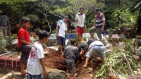 Foto: Longsor di TPU Cikaret, Bogor terjadi pada Minggu (11/11/2018), sekitar pukul 17.00 WIB. (Farhan-detikcom)