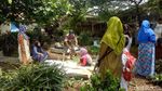 Penampakan Mayat Keluar dari Kubur Akibat Longsor di Bogor