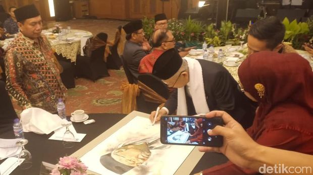 Lukisan bergambar Ma'ruf Amin. 