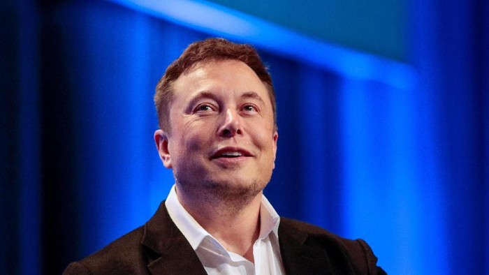Tesla and SpaceX CEO Elon Musk smiles during a 
