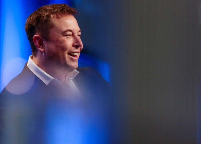 Tesla and SpaceX CEO Elon Musk smiles during a 