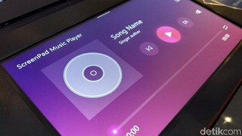 Ada numpad, kalender, kalkulator, pemutar musik, dan launcher untuk menjalankan aplikasi di dalam laptop. Foto: Muhamad Imron Rosyadi/detikINET