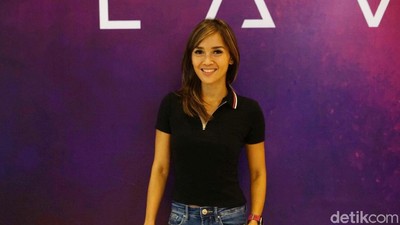 Foto Health: Bugar ala Pelari Cantik Sally Tanudjaja