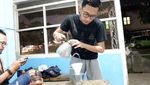 Potret Nabhan Cody, Driver Ojol Ganteng yang Hobi Kulineran dan Minum Kopi