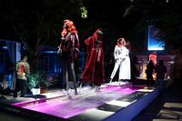 Koleksi Fashion Nova x Cardi B dipajang saat acara peluncurannya di Hollywood. Foto: Getty Images