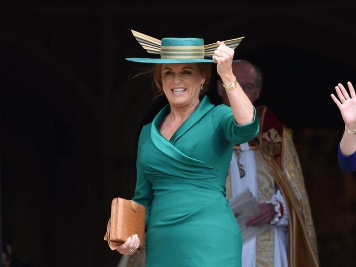 WINDSOR, ENGLAND - OCTOBER 12: Sarah, Duchess of York arrives for the wedding of Princess Eugenie to Jack Brooksbank at St Georges Chapel in Windsor Castle on October 12, 2018 in Windsor, England. (Photo by  Jeremy Selwyn - WPA Pool/Getty Images)
