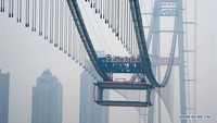 Setelah selesai, jembatan ini akan memiliki dua dek jalan enam lajur dan diharapkan bisa memudahkan lalu lintas. Istimewa/Xinhuanet.