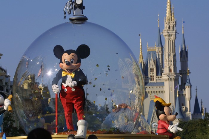 Bangkok, Thailand - January 6, 2015: Mickey Mouse action figure the official mascot of The Walt Disney Company. Mickey Mouse is a funny animal cartoon character was created by Walt Disney studio.