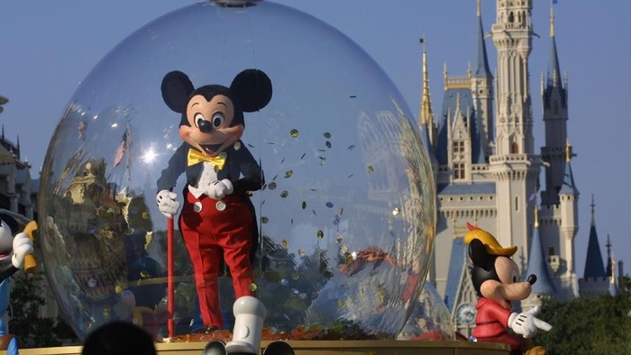 Bangkok, Thailand - January 6, 2015: Mickey Mouse action figure the official mascot of The Walt Disney Company. Mickey Mouse is a funny animal cartoon character was created by Walt Disney studio.
