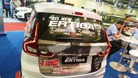 Selain itu penggunaan decal sticker, airbrush serta lampu LED semakin memperkuat kesan sporty. Foto: Dok. Suzuki