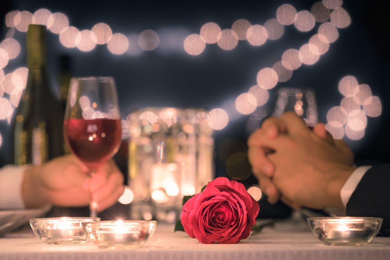 Close up image of a couple having dinner in fine dining restaurant.