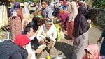 Kehangatan Tradisi Ngaruwat Lembur di Ciamis dalam Foto