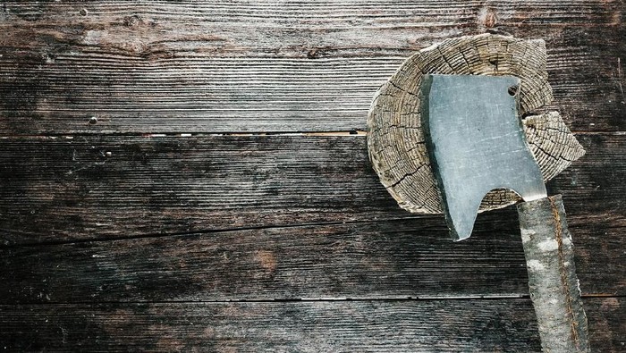 Butchers set for chopping meat: wooden block and chopper with rough handle