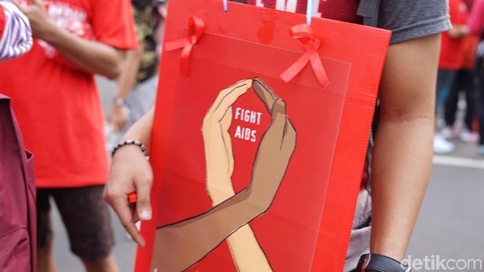 Peringatan Hari AIDS Sedunia 2018 di Car Free Day. Foto: Ayunda Septiani/detikHealth Peringatan Hari AIDS Sedunia 2018 di Car Free Day. Foto: Ayunda Septiani/detikHealth
