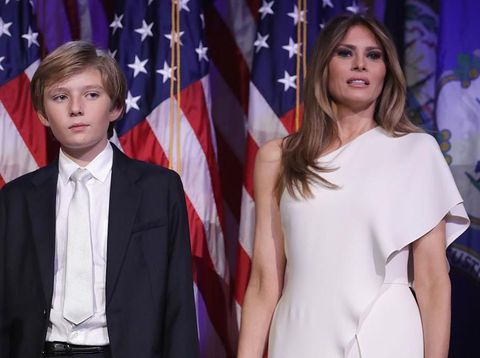 HOLLYWOOD, CA - JANIUARY 16:  Donald Trump (L) , wife Melania (C) and son Baron attend the ceremony honoring him with a star on the Hollywood Walk of Fame on January 16, 2006 in Hollywood, California. (Photo by Vince Bucci/Getty Images)