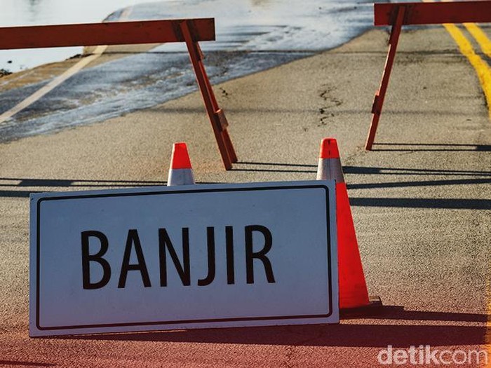 Ilustrasi Jalan tertutup akibat banjir, pengalihan arus akibat banjir, awas banjir
