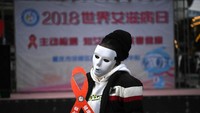 Peringatan Hari Aids Sedunia di Chongqing, China. (Chen Chao/CNS via REUTERS) 