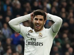 Marco Asensio mengalami masalah pada otot rectus femoris paha kanannya. Cedera itu didapat saat semifinal Piala Dunia Antarklub. (Foto: Sergio Perez/Reuters)