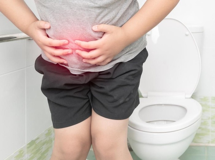 fat boy suffer stomach and sit in toilet, diarrhea constipation and health concept
