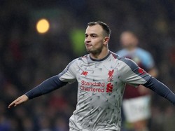 Xherdan Shaqiri menambah gol lagi untuk Liverpool pada masa injury time. REUTERS/Scott Heppell.