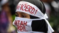 Ekspresi peserta aksi anti-ICERD di Malaysia (Foto: AFP)