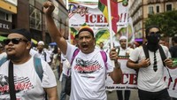 Ekspresi para peserta aksi di Malaysia (Foto: AFP)