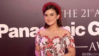 Audi selalu tersenyum kepada kamera saat berpose. Pool/Noel/detikFoto.