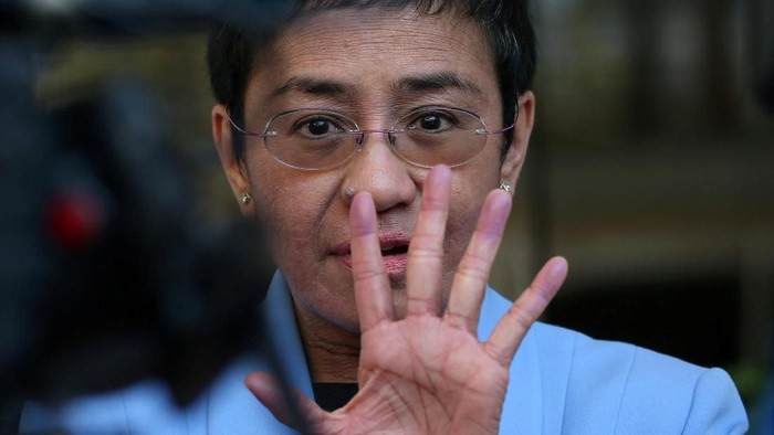 Maria Ressa, an executive of online news platform Rappler, speaks to the media after posting bail for tax evasion charges at Regional Trial Court Branch 265 in Pasig City, Metro Manila, in Philippines, December 3, 2018. REUTERS/Eloisa Lopez