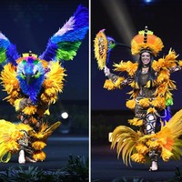 Kostum nasional Miss Brazil 2018 Myra Dias paling banyak dijagokan menang di Miss Universe 2018. Dalam sesi penjurian, Mayra tampil mengenakan kostum yang dinamai Deusa Do Sol. Kostum tersebut dibuat untuk menghormati suku asli Brazil. Dalam balutan kostum berwarna kuning itu Mayra memberikan kejutan di akhir penampilannya di mana dia menjelma menjadi burung. Foto: Lillian SUWANRUMPHA / AFP