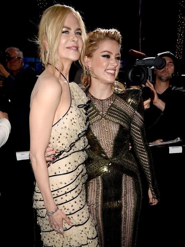 Selain Amber, hadir pula lawan mainnya, Nicole Kidman. Ia memesona dalam balutan ruffle bertumpuk dari Giorgio Armani.  (Foto: Getty Images)