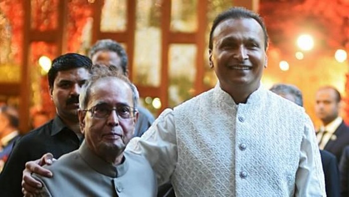 Former President of India (L) and Indian businessman Anil Ambani pose for a picture as they attend the wedding ceremony of Indian businesswoman Isha Ambani with Indian business men Anand Piramal in Mumbai on December 12, 2018. - Topping anything in hit film 