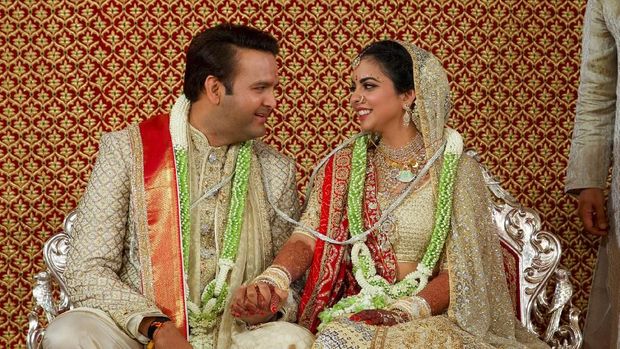 Bride Isha Ambani, the daughter of the Chairman of Reliance Industries Mukesh Ambani, and her groom Anand Piramal, heir to a real-estate and pharmaceutical business, after they got married in Mumbai, India, December 12, 2018. Reliance Industries/Handout via REUTERS  ATTENTION EDITORS - THIS IMAGE WAS PROVIDED BY A THIRD PARTY. NO RESALES. NO ARCHIVE.