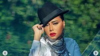 Namun ia mengaku menyesal telah memakai dress tersebut dan memohon maaf atas kesalahannya. Dok. Instagram/raniayoussef_