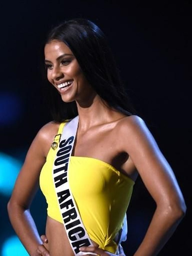 Siapa Tamaryn Green? Mewakili Afrika Selatan, Tamaryn tak sekadar seksi. Otak yang cerdas ditambah rasa percaya diri yang kuat juga menjadi modalnya di Miss Universe. (Foto: Lillian SUWANRUMPHA / AFP)