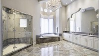 Rumah ini punya lampu gantung emas 14 karat yang dilapisi kristal Swarovski. Istimewa/Business Insider.