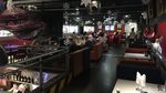 Gokil! Ada Mobil F1 Ditempel di Dinding Cafe Ini