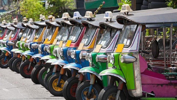 Row of Thai Tuk-tuks. Bangkok, Thailand.