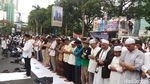 Massa Membaur Menolak Kekerasan pada Muslim Uighur