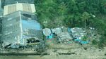 Melihat dari Udara Rumah yang Porak-poranda Disapu Tsunami