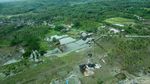 Melihat dari Udara Rumah yang Porak-poranda Disapu Tsunami