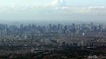 Menikmati Keindahan Kota Jakarta dari Udara