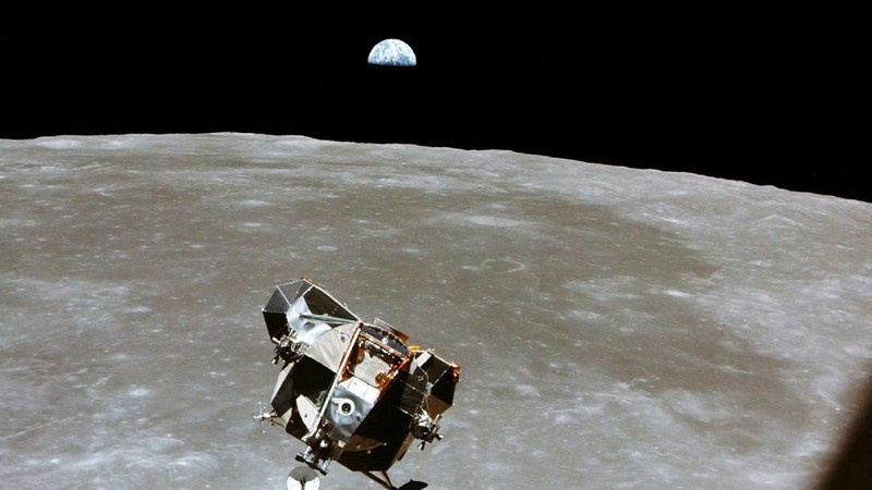 376713 18: (FILE PHOTO) With a half-Earth in the background, the Lunar Module ascent stage with Moon-walking Astronauts Neil Armstrong and Edwin Aldrin Jr. approaches for a rendezvous with the Apollo Command Module manned by Michael Collins. The Apollo 11 liftoff from the Moon came early, ending a 22-hour stay on the Moon by Armstrong and Aldrin. The 30th anniversary of the Apollo 11 Moon mission is celebrated July 20, 1999. (Photo by NASA/Newsmakers)