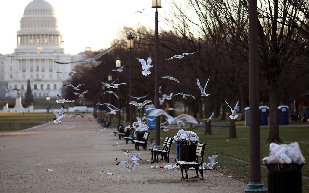 WASHINGTON, DC - DECEMBER 24:  Trash begins to accumulate along the National Mall near the Washington Monument due to a partial shutdown of the federal government on December 24, 2018 in Washington, DC. The partial shutdown will continue for at least a few more days as lawmakers head home for the holidays as Democrats and the Trump administration cannot agree on an amount of funding for border security. (Photo by Win McNamee/Photo by Win McNamee/Getty Images)