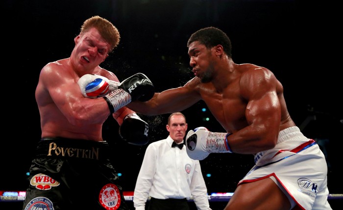 Anthony Joshua in action against Alexander Povetkin during boxing WBA Super, IBF, WBO & IBO World Heavyweight Titles at Wembley Stadium, London, Britain, September 22, 2018. Action Images via Reuters/Andrew Couldridge  SEARCH 