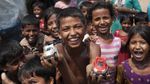 Potret Senyum Manis Anak-anak di Negara Konflik