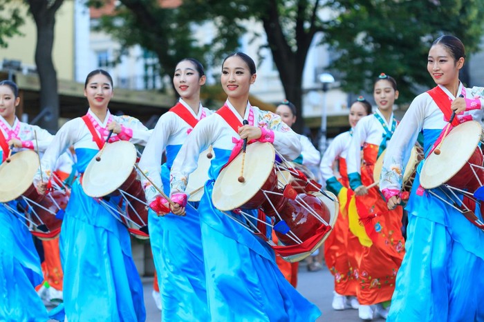 Veliko Tarnovo, Bulgaria- July 25, 2015: South Korean group for traditional music make performance in Veliko Tarnovo. South Korean group in traditional costumes plays traditional drum music on 