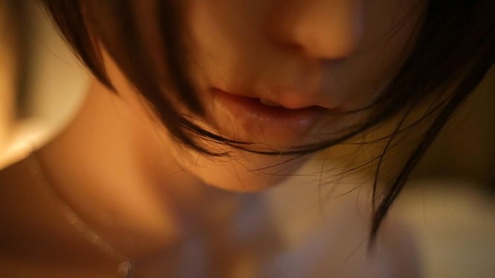 91281504 TOKYO, JAPAN - JUNE 25: Senji Nakajima watches TV with his Love Doll